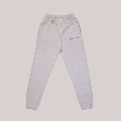 Ox Season Light Gray Sweatpants – Athletic joggers with a minimalist 'Ox Season' logo on the upper left thigh. Comfortable and stylish fitness wear for training and casual wear